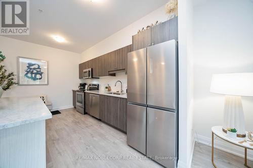 201 - 64 Queen Street S, New Tecumseth (Tottenham), ON - Indoor Photo Showing Kitchen