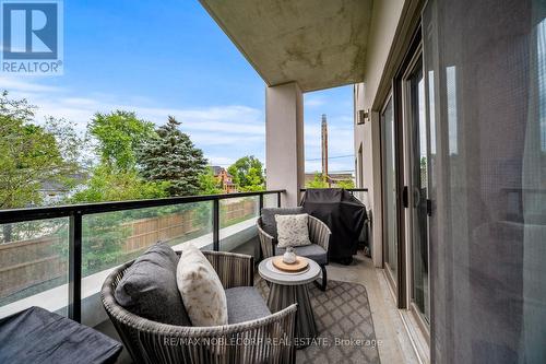 201 - 64 Queen Street S, New Tecumseth (Tottenham), ON - Outdoor With Balcony With Exterior