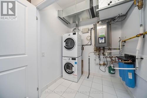 201 - 64 Queen Street S, New Tecumseth (Tottenham), ON - Indoor Photo Showing Laundry Room