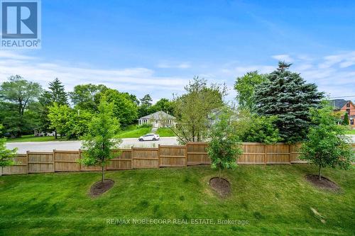 201 - 64 Queen Street S, New Tecumseth (Tottenham), ON - Outdoor With Backyard