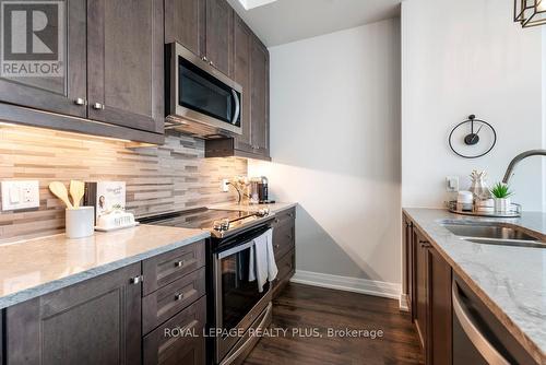 514 - 150 Oak Park Boulevard, Oakville (Uptown Core), ON - Indoor Photo Showing Kitchen With Upgraded Kitchen