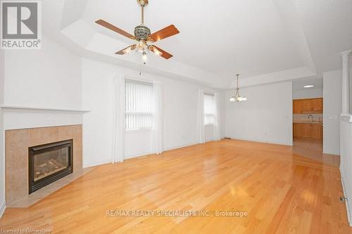 28 - 11 Twentyplace Boulevard, Hamilton, ON - Indoor Photo Showing Living Room With Fireplace