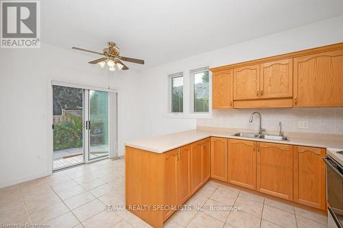 28 - 11 Twentyplace Boulevard, Hamilton (Twenty Place), ON - Indoor Photo Showing Kitchen With Double Sink