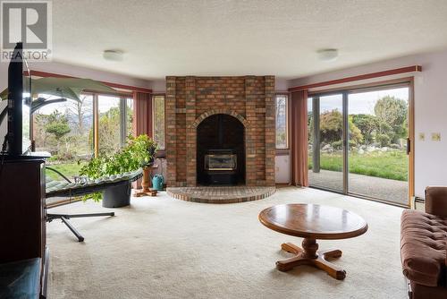 6841 Raven Road, Vernon, BC - Indoor Photo Showing Living Room With Fireplace