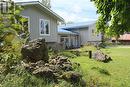 Front view of house with a lawn - 208 Pellisier Street, Eugenia, ON  - Outdoor 