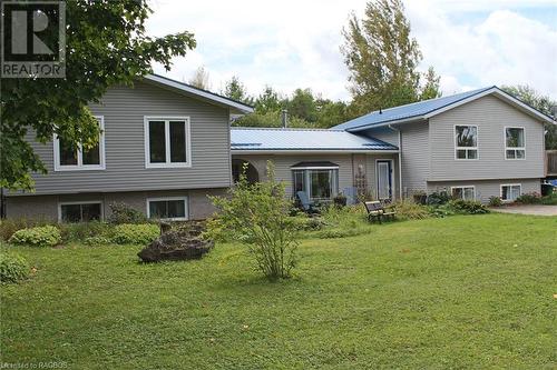 Front of house featuring a yard - 208 Pellisier Street, Eugenia, ON - Outdoor