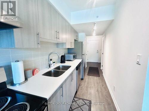 309 - 1 Falaise Road, Toronto (West Hill), ON - Indoor Photo Showing Kitchen With Double Sink