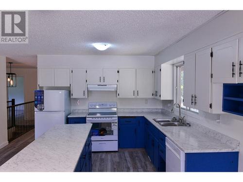 13630 Chief Lake Road, Prince George, BC - Indoor Photo Showing Kitchen With Double Sink