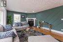 8219 St Patrick Avenue, Prince George, BC  - Indoor Photo Showing Living Room With Fireplace 