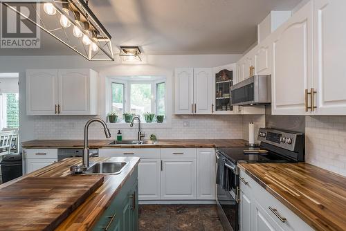 8219 St Patrick Avenue, Prince George, BC - Indoor Photo Showing Kitchen With Double Sink