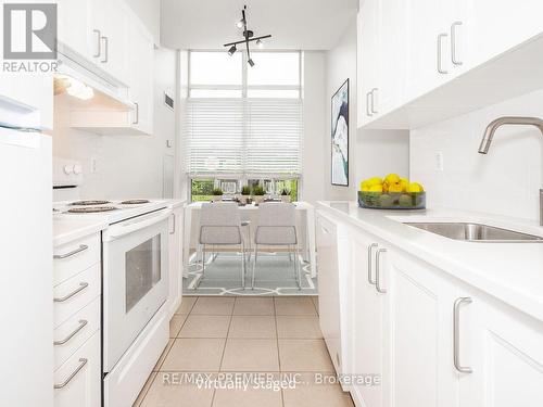 113 - 55 Strathaven Drive, Mississauga (Hurontario), ON - Indoor Photo Showing Kitchen