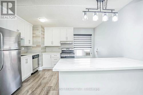 #209 - 180 Mississauga Valley Boulevard, Mississauga, ON - Indoor Photo Showing Kitchen With Stainless Steel Kitchen