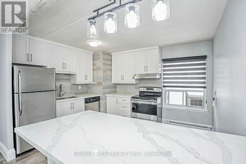 #209 - 180 Mississauga Valley Boulevard, Mississauga, ON - Indoor Photo Showing Kitchen With Stainless Steel Kitchen