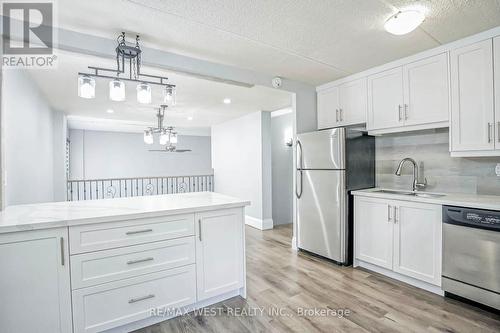 #209 - 180 Mississauga Valley Boulevard, Mississauga, ON - Indoor Photo Showing Kitchen With Stainless Steel Kitchen