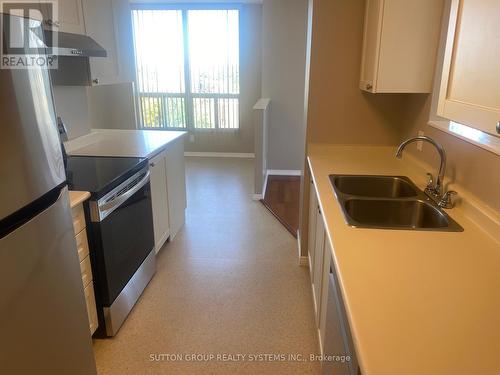 1402 - 100 Millside Drive S, Milton (Old Milton), ON - Indoor Photo Showing Kitchen With Double Sink