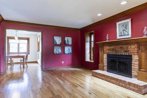 12 Ridge Point Drive, St. Catharines, ON - Indoor Photo Showing Living Room With Fireplace