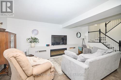 47 Flynn Court, St. Catharines, ON - Indoor Photo Showing Living Room With Fireplace