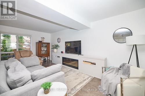 47 Flynn Court, St. Catharines, ON - Indoor Photo Showing Living Room With Fireplace