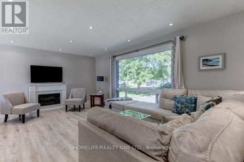 329 Lakeshore Road, Brighton, ON - Indoor Photo Showing Living Room With Fireplace