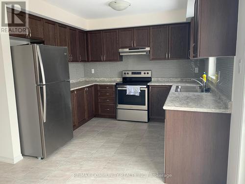 2613 Deputy Minister Path, Oshawa, ON - Indoor Photo Showing Kitchen With Stainless Steel Kitchen With Double Sink