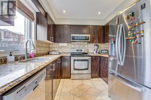 64 Metcalfe Drive, Bradford West Gwillimbury, ON - Indoor Photo Showing Kitchen With Stainless Steel Kitchen With Double Sink With Upgraded Kitchen