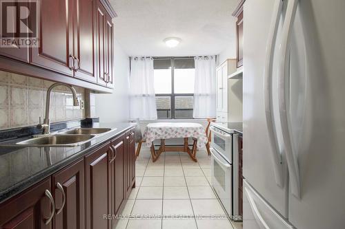 1602 - 21 Knightsbridge Road, Brampton (Queen Street Corridor), ON - Indoor Photo Showing Kitchen With Double Sink With Upgraded Kitchen