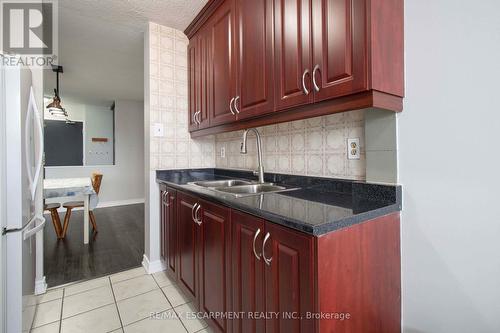 1602 - 21 Knightsbridge Road, Brampton (Queen Street Corridor), ON - Indoor Photo Showing Kitchen With Double Sink