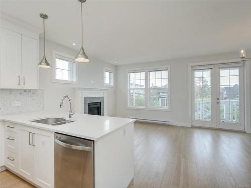 6-1016 Southgate St, Victoria, BC - Indoor Photo Showing Kitchen With Fireplace With Double Sink With Upgraded Kitchen