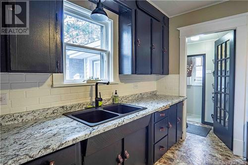 8 Wharf Road, Newcastle Creek, NB - Indoor Photo Showing Kitchen With Double Sink