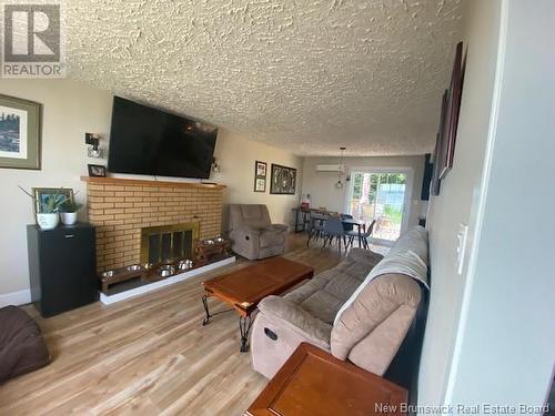 544 Montgomery Street, Dalhousie, NB - Indoor Photo Showing Living Room With Fireplace