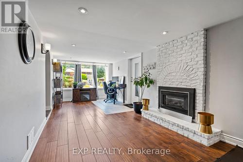 17 Battlefield Drive, Hamilton (Stoney Creek), ON - Indoor Photo Showing Living Room With Fireplace