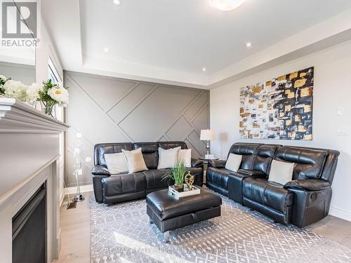 24 Trailbank Gardens, Hamilton (Waterdown), ON - Indoor Photo Showing Living Room With Fireplace