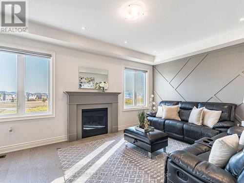 24 Trailbank Gardens, Hamilton (Waterdown), ON - Indoor Photo Showing Living Room With Fireplace