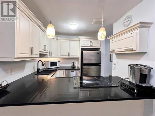 10 Derby Lane Unit# 306, Sarnia, ON - Indoor Photo Showing Kitchen With Double Sink