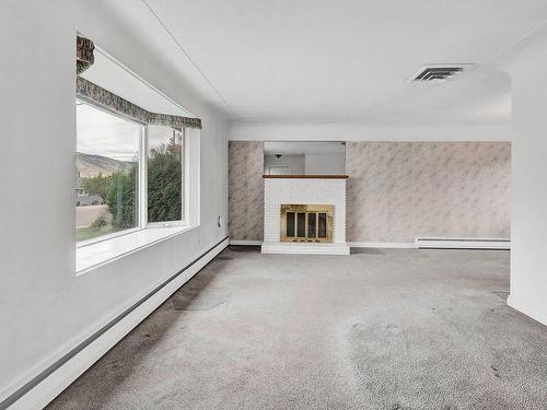 939 Mcmurdo Drive, Kamloops, BC - Indoor Photo Showing Other Room With Fireplace