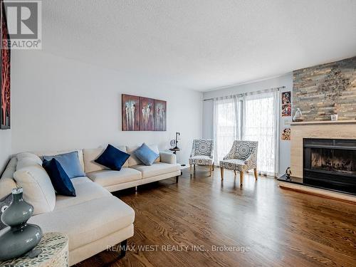 31 - 3050 Orleans Road, Mississauga, ON - Indoor Photo Showing Living Room With Fireplace