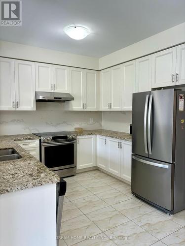 68 Mohandas Drive, Markham (Cedarwood), ON - Indoor Photo Showing Kitchen With Double Sink