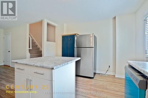 Kitchen Main Floor - 67 - 7768 Ascot Circle, Niagara Falls, ON - Indoor Photo Showing Kitchen