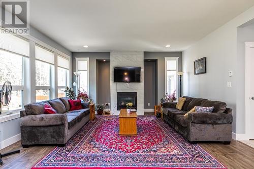 3826 Barnes Drive, Prince George, BC - Indoor Photo Showing Living Room With Fireplace