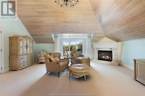 1020 Road 6 East, Kingsville, ON - Indoor Photo Showing Living Room With Fireplace