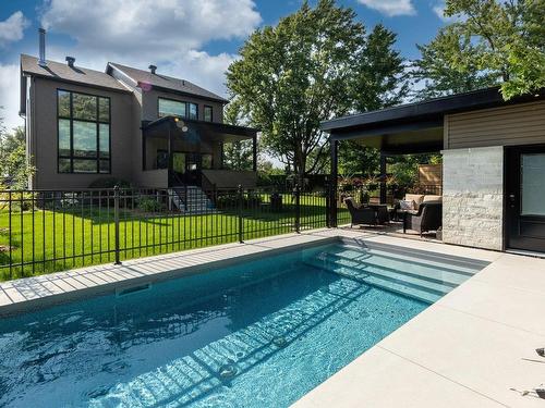 Face arriÃ¨re - 886 Rue Bellerive, Saint-Jean-Sur-Richelieu, QC - Outdoor With In Ground Pool