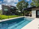 Face arriÃ¨re - 886 Rue Bellerive, Saint-Jean-Sur-Richelieu, QC  - Outdoor With In Ground Pool 