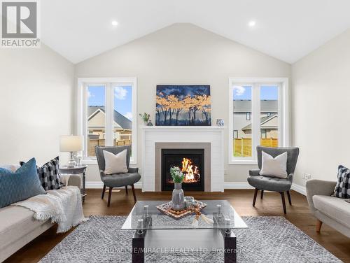 111 Livingston Drive, Tillsonburg, ON - Indoor Photo Showing Living Room With Fireplace