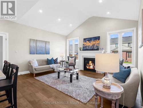 111 Livingston Drive, Tillsonburg, ON - Indoor Photo Showing Living Room With Fireplace