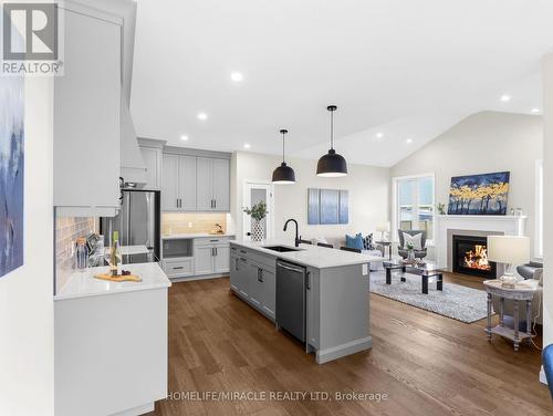 111 Livingston Drive, Tillsonburg, ON - Indoor Photo Showing Kitchen With Fireplace With Upgraded Kitchen