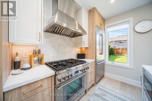 49 Jackson Drive, New Tecumseth (Tottenham), ON - Indoor Photo Showing Kitchen With Upgraded Kitchen