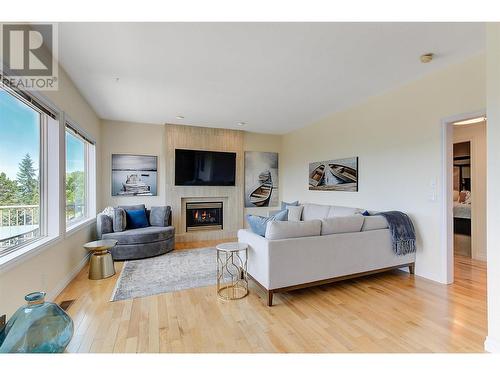 1044 James Hockey Place, Kelowna, BC - Indoor Photo Showing Living Room With Fireplace