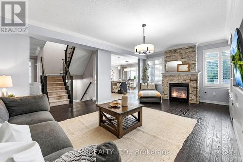 77 Gimblett Street W, Clarington (Bowmanville), ON - Indoor Photo Showing Living Room With Fireplace