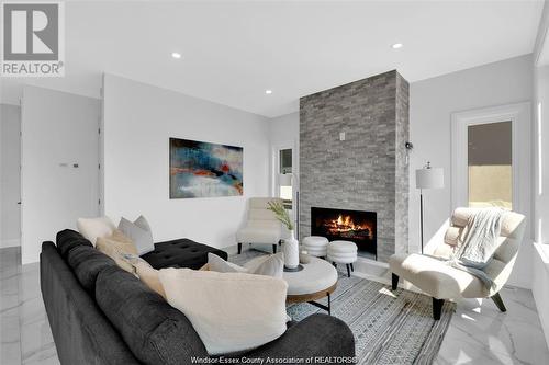 2596 Mayfair, Lasalle, ON - Indoor Photo Showing Living Room With Fireplace