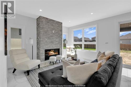 2596 Mayfair, Lasalle, ON - Indoor Photo Showing Living Room With Fireplace